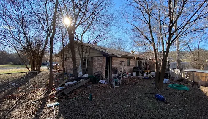 Code violations house in Ennis Texas bought for cash by Hippie Home Buyers
